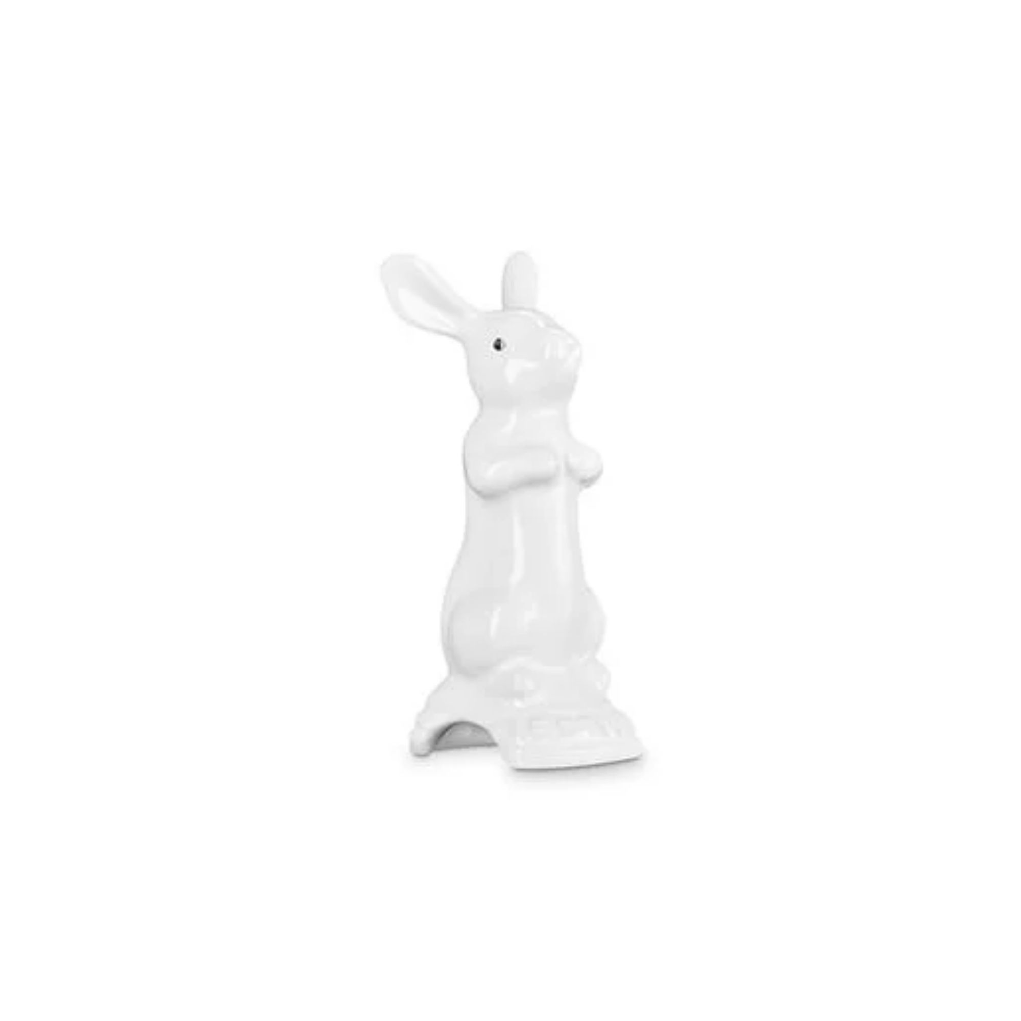 A small white ceramic bunny shaped pie vent
