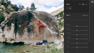 Lightroom interface showing photo of man climbing a rockface