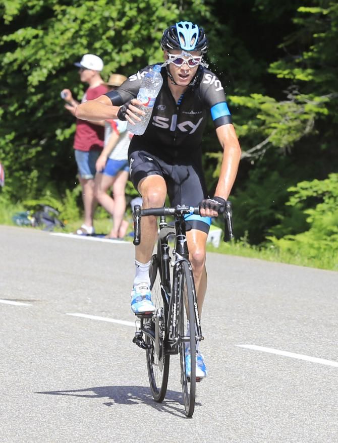 Chris Froome (Sky) gets some relief from the heat