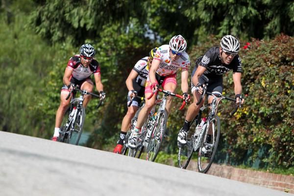 Glen Chadwick (Pure Black) leads another break up the road.