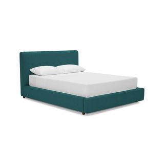 Storage bed featuring jewel teal upholstery