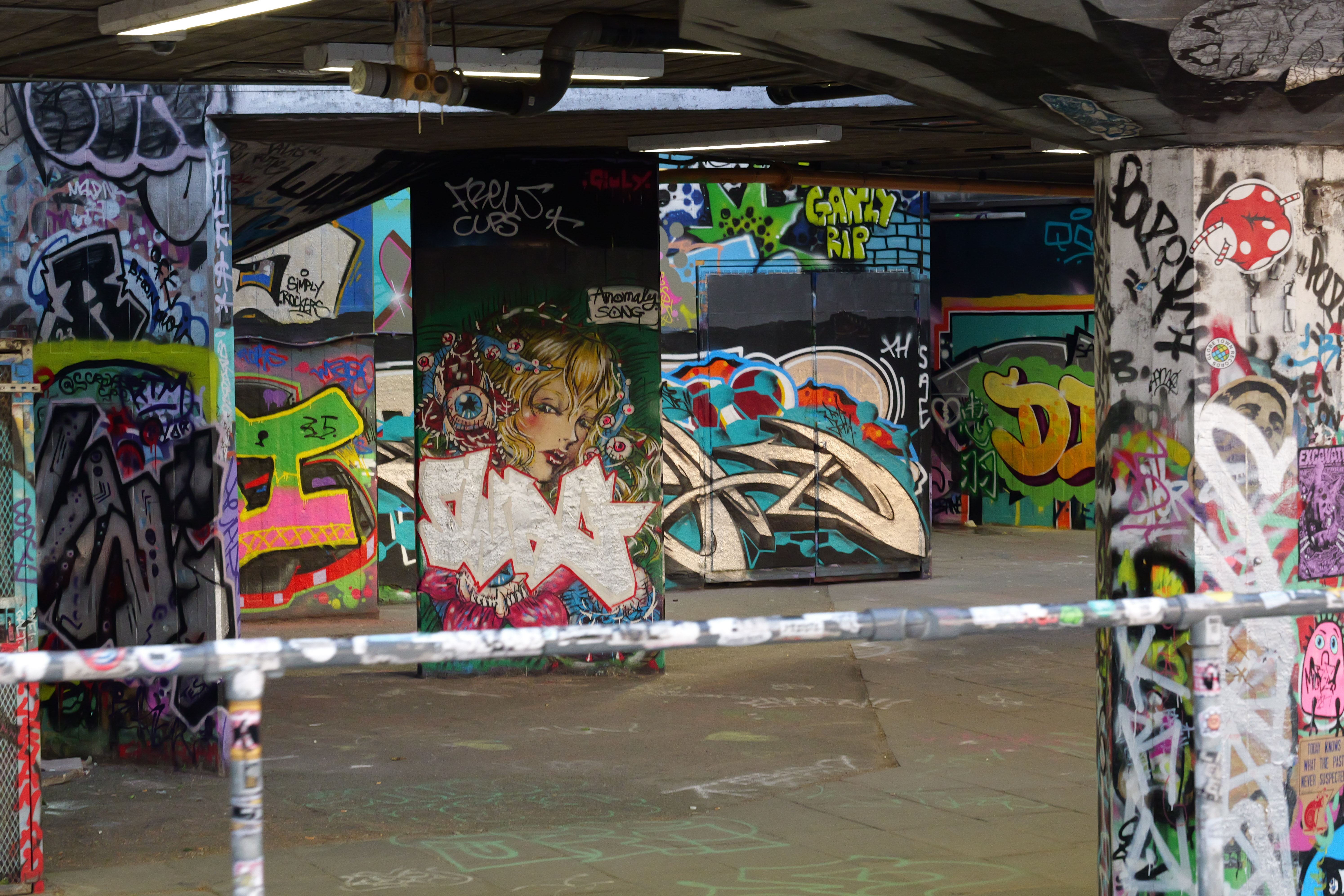 Skate park with pillars covered in graffiti