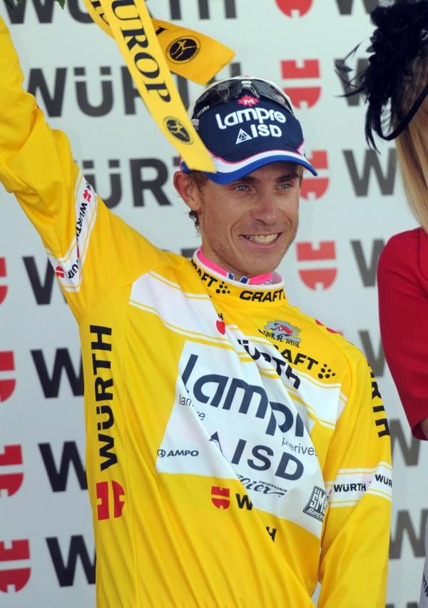 A radiant Damiano Cunego in yellow