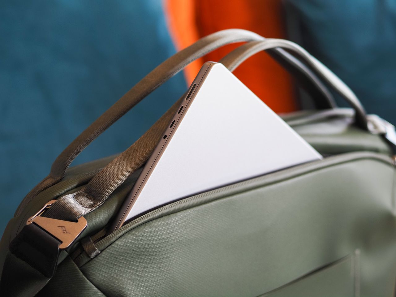 Peak Design Travel Weekender 25L bag with laptop poking out one pocket