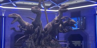 Four Raptors together inside the line queue for the VelociCoaster at Universal Orlando
