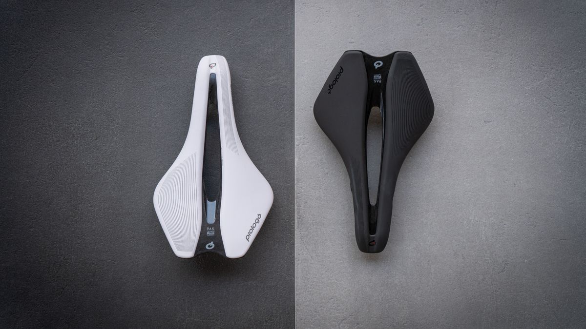 Black and white Prologo Dimension R2 saddles next to each other 