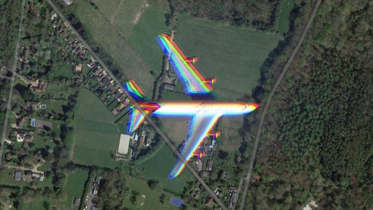 A plane caught flying on Google Maps
