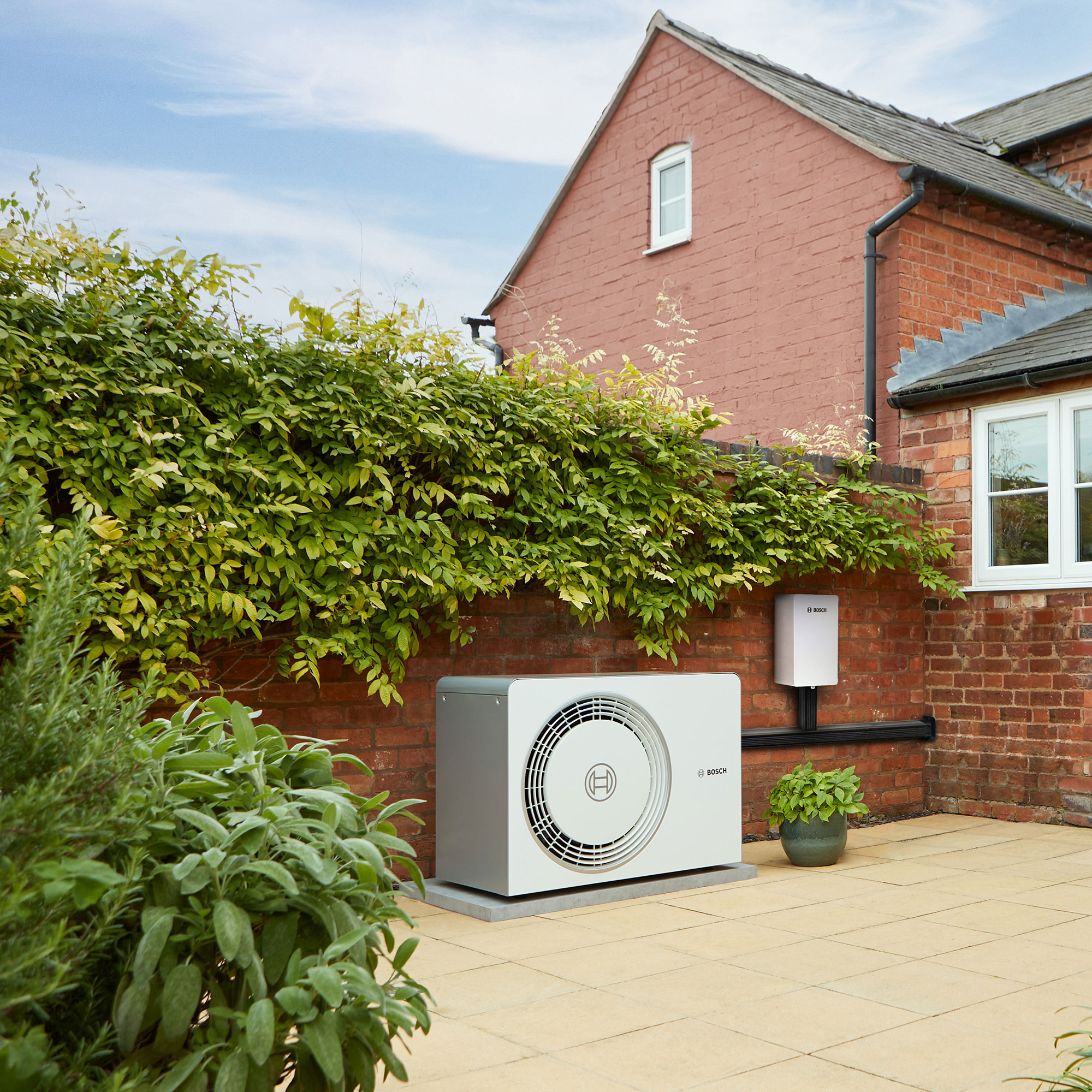 Worcester Bosch heat pump on terrace outside house