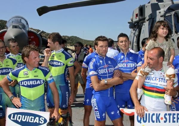 Danilo Di Luca (Liquigas) eyes world champion Paolo Bettini (QuickStep) during the team presentaitons for the 2007 Giro, which took place on an aircraft carrier off of Sardinia.