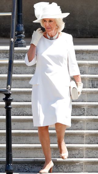 Queen Camilla in an all-white ensemble