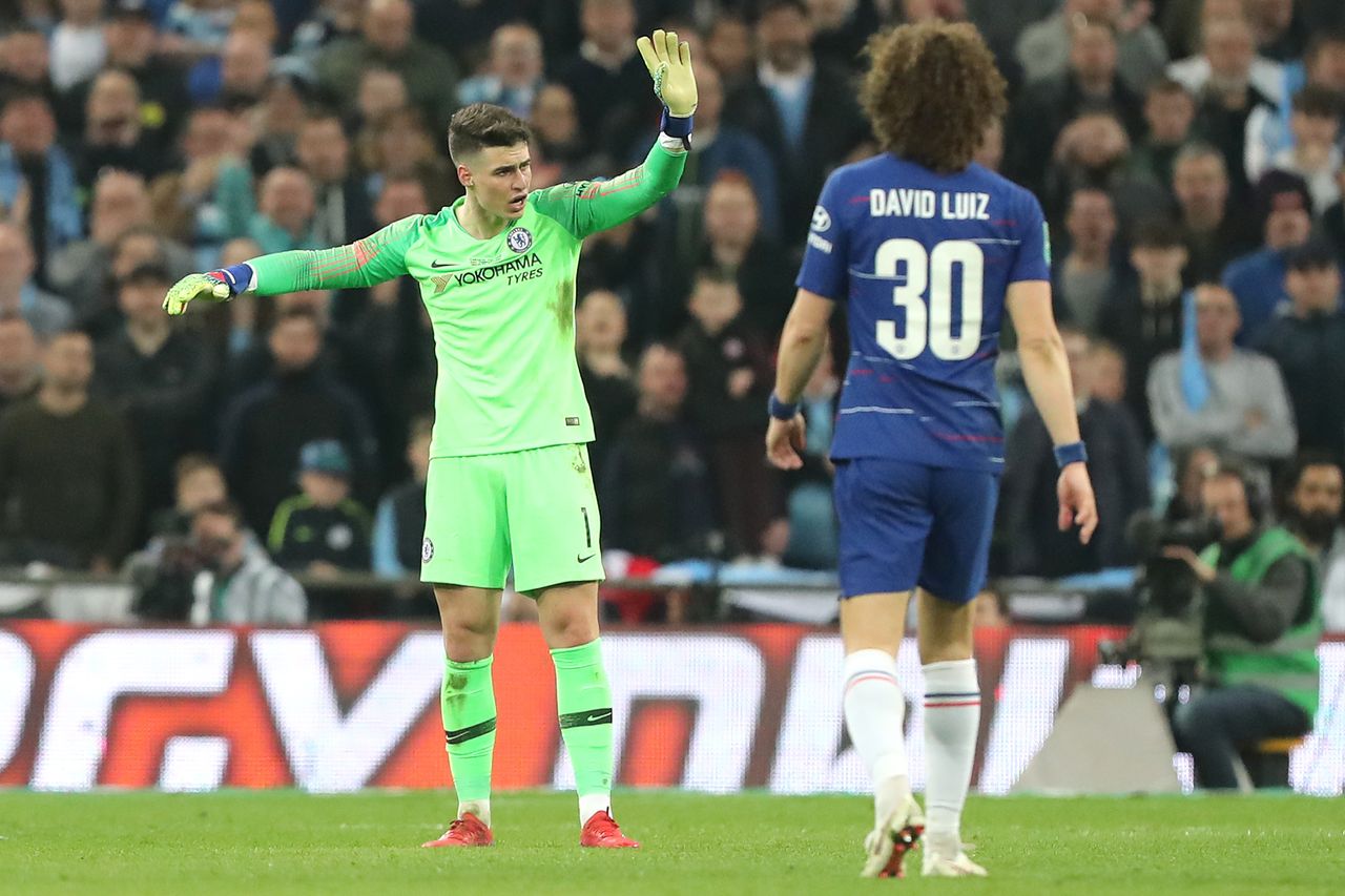 Chelsea goalkeeper Kepa Arrizabalaga argues with manager Maurizio Sarri, refusing to be substituted off during the 2019 League Cup final against Manchester City at Wembley