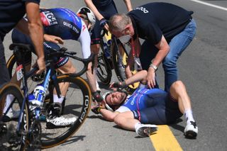 Mark Cavendish rides on at UAE Tour after hard crash and head impact