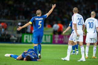 Fabio Cannavaro of Italy calls to the referee after the incident involving Zinedine Zidane of France and Marco Materazzi of Italy during the World Cup Final match between France (1) and Italy (1). Italy would win on penalties (5) to (3) at the Olympiastadion on July 09, 2006 in Berlin, Germany. (Photo by Simon Bruty/Anychance/Getty Images)