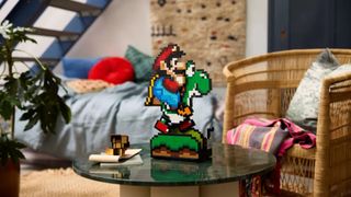 Lego Super Mario World set on a table in a home setting, with a chair and stairs in the background