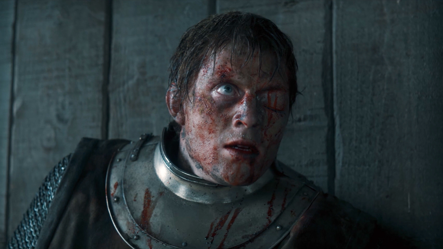 A severely injured Dunk looking at at someone off-camera in A Knight of the Seven Kingdoms episode 5