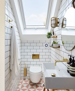 Tiled loft bathroom with large skylight