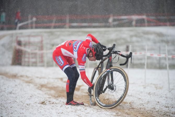 Logan Owen struggles to put his chain back on after dropping it in the sand section