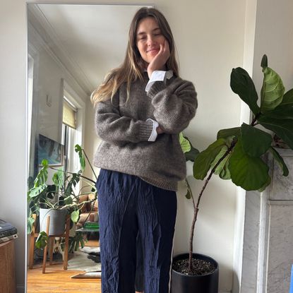 Aemilia Madden wearing a cardigan and track pants