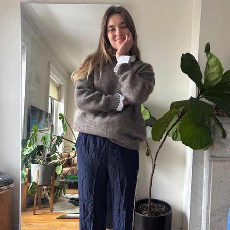 Aemilia Madden wearing a cardigan and track pants