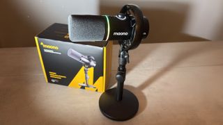 Shot of the Maono PD200W mounted on its supple stand