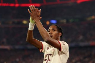 Mathys Tel applauds the Bayern Munich fans after he is substituted in a game against Slovan Bratislava in January 2025.