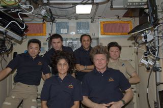 Expedition Crew Pose After Changing-of-Command Ceremony