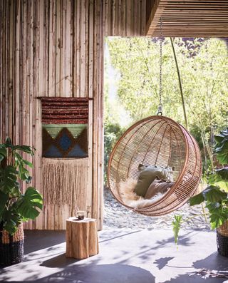 modern outdoor furniture ideas with hanging garden swing chair