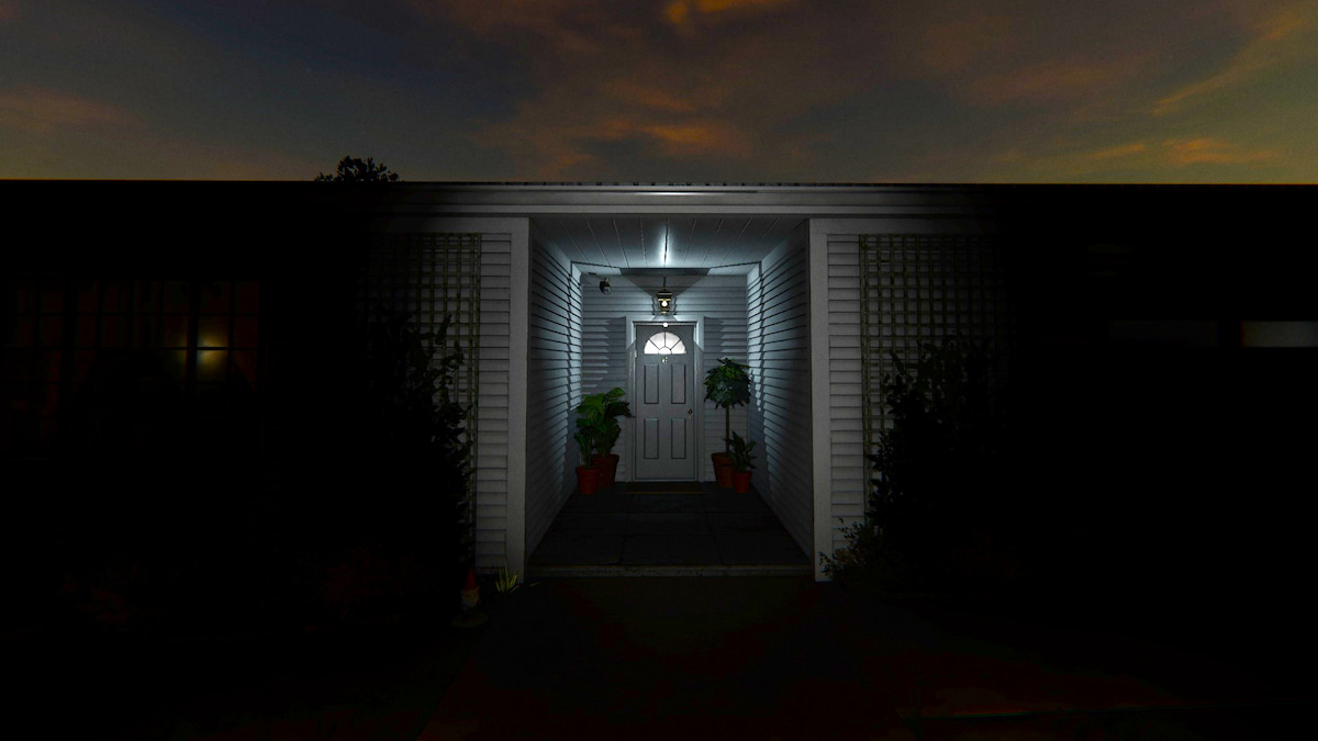 6 Tanglewood Drive's front door, illuminated by a hall light