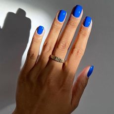 Cobalt blue nail polish in sunlight