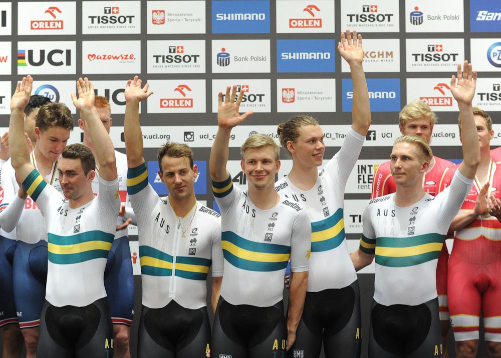 World champions team Australia's cyclists Samuel Welsford, Kellard O'Brien, Leigh Howard, Alexander Porter and Cameron Scott celebrate celebrate during the award ceremony after winning the Men's Team Pursuit