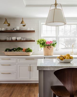 white and grey kitchen with marble kitchen island by Liz Caan & Co