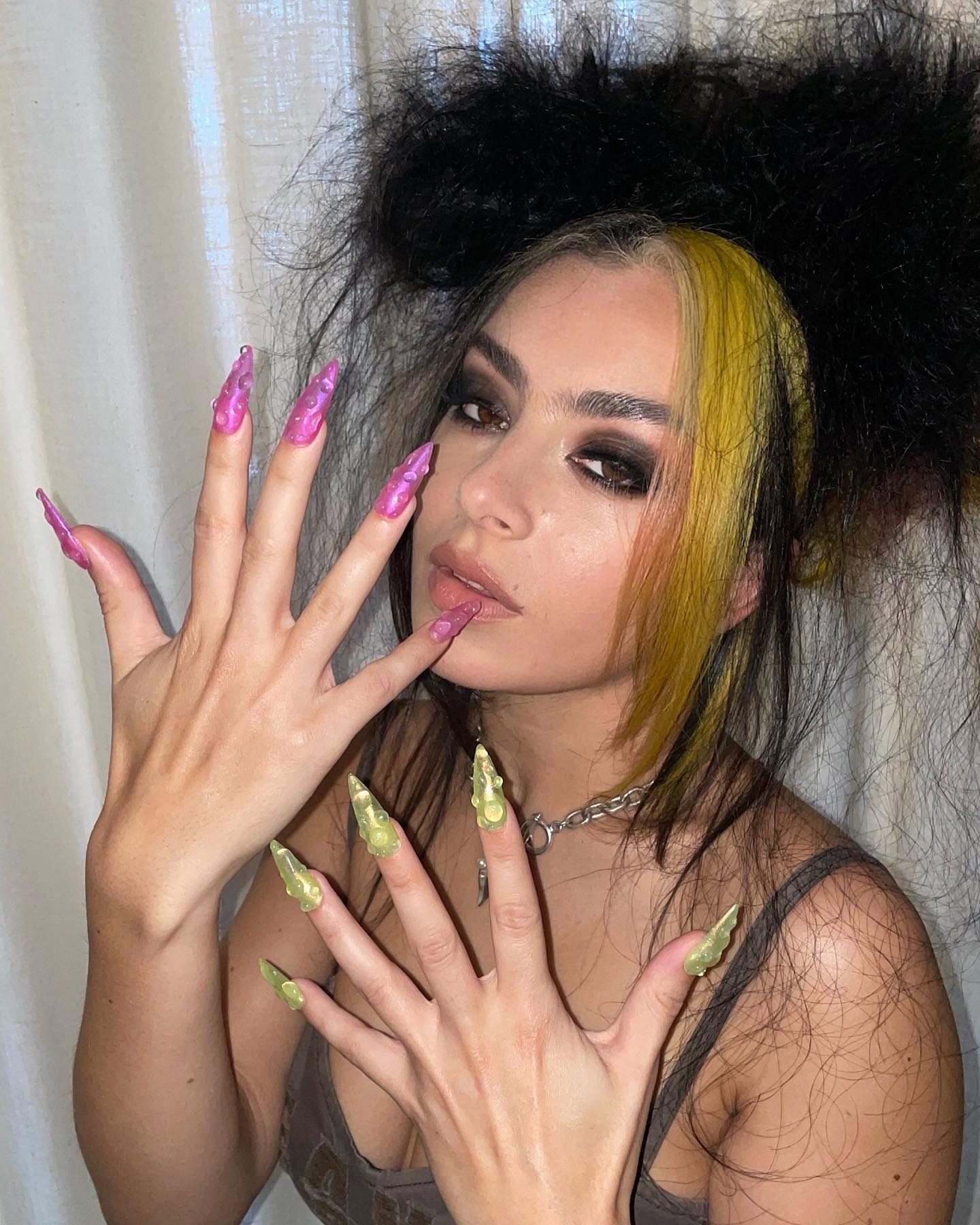 Image posted on Instagram by Juan Alvear's Charli XCX, wearing jelly nails.