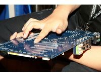 Coating the motherboard with a protective agent.