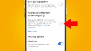 A phone on a yellow background showing the Google Maps glanceable directions option in settings