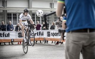 Have it! Peter Sagan volleys a football with his front wheel