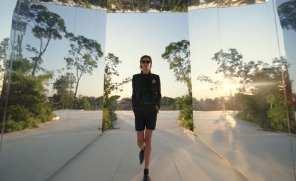 Saint Laurent S/S 2022 collection staged in a living artwork designed by Doug Aitken