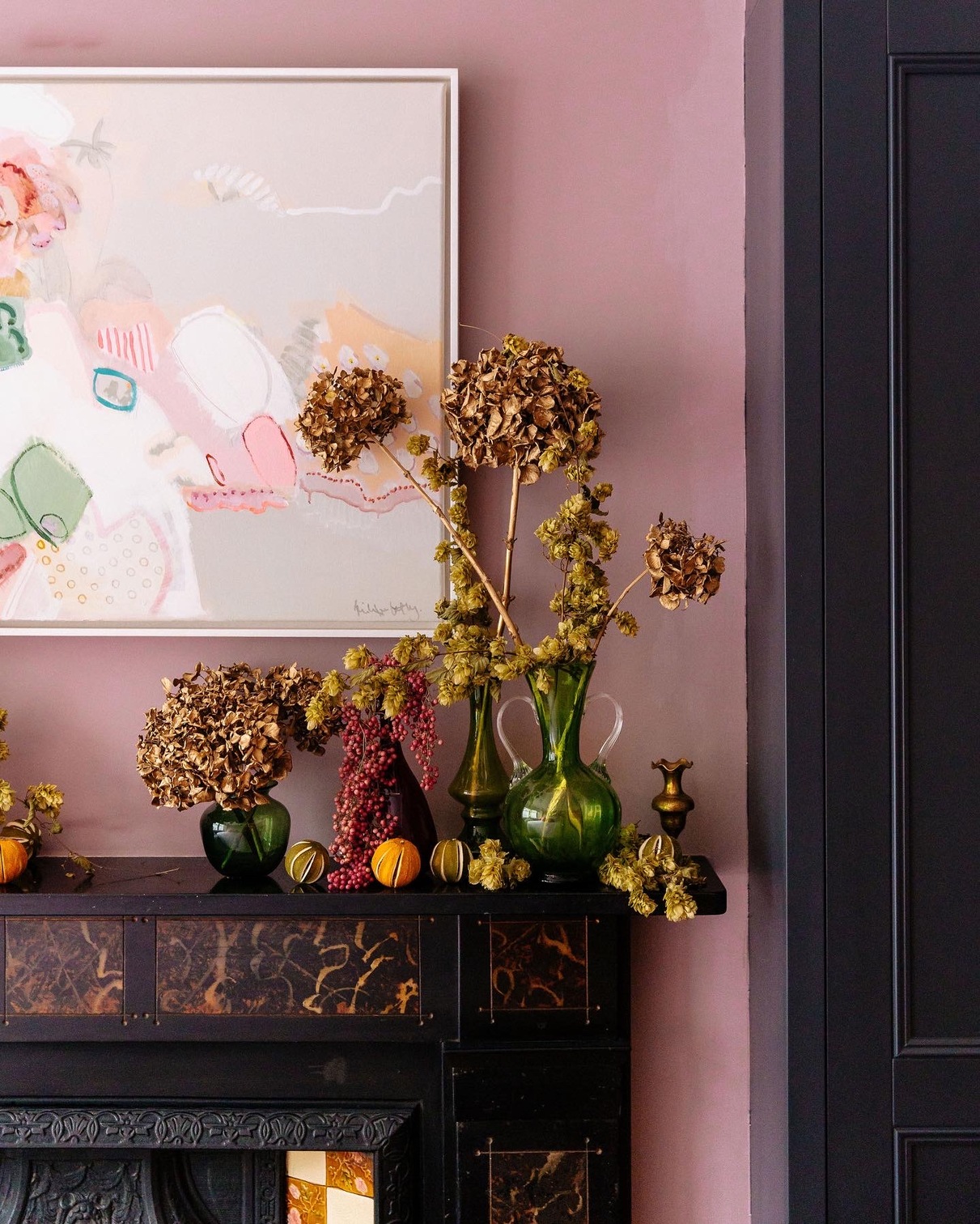 dried hydrangea on a fireplace mantel