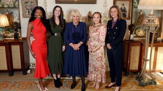 Queen Camilla with four women who represent domestic violence charities