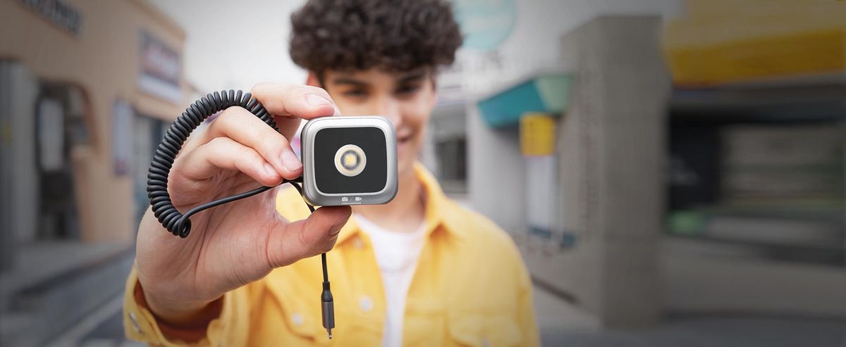 Person holding the Anker iPhone LED Flash