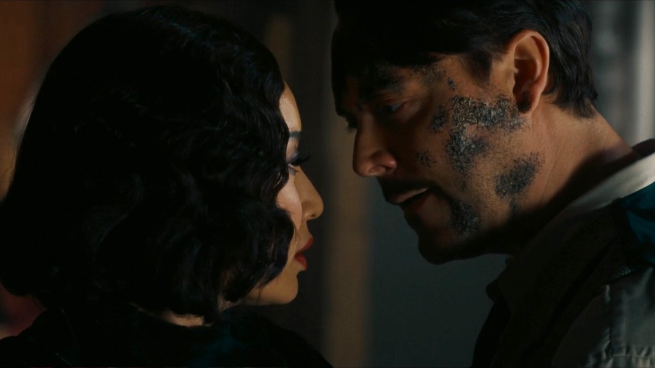 Li Jun Li and Jack Huston with their faces close in Spider-Noir.