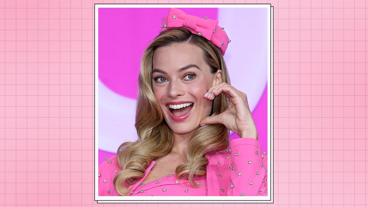 Margot Robbie pictured with pink french tip nails at the press conference for &quot;Barbie&quot; on July 03, 2023 in Seoul, South Korea