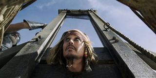 Captain Jack Sparrow in a guillotine in Pirates of the Caribbean: Dead Men Tell No Tales