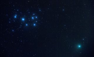 A Green Comet and a Blue Star Cluster