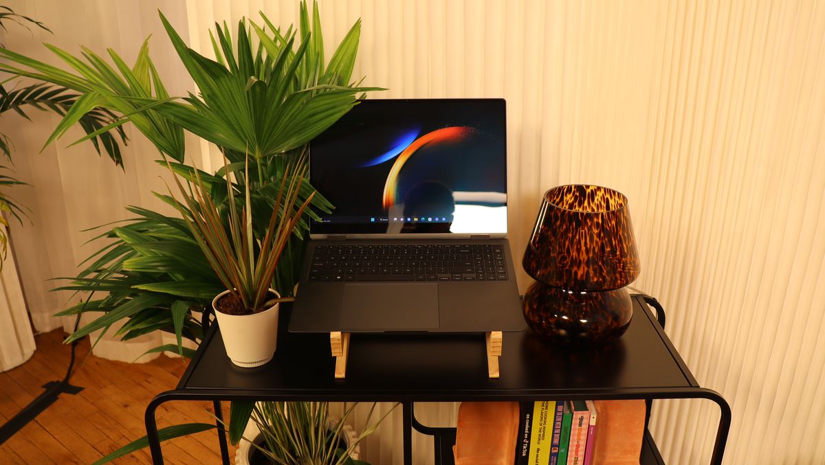 Samsung Galaxy Book3 on a wooden stand