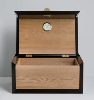 Wooden box with built in clock