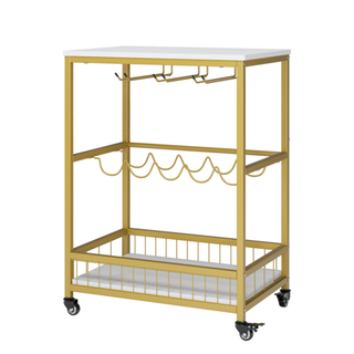 A white and gold bar cart with wine rack built in