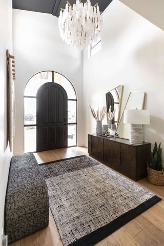 A hallway with a rug