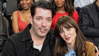 Jonathan Scott and Zooey Deschanel attend an LA Lakers game in January 2026.