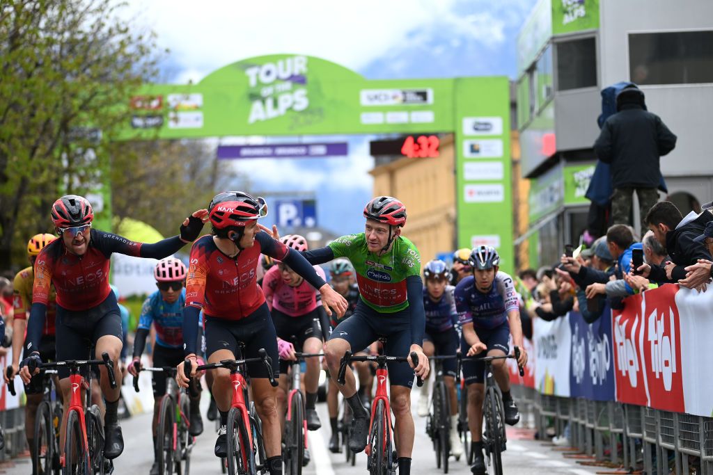 BRUNICO ITALY APRIL 21 LR Laurens De Plus of Belgium Geraint Thomas of United Kingdom and final overall winner Tao Geoghegan Hart of United Kingdom and Team INEOS Grenadiers Green Leader Jersey react after the 46th Tour of the Alps 2023 Stage 5 a 1445km stage from Cavalese to Brunico on April 21 2023 in Brunico Italy Photo by Tim de WaeleGetty Images