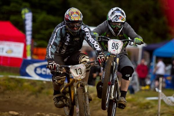 Two four cross riders duke it out in Afan